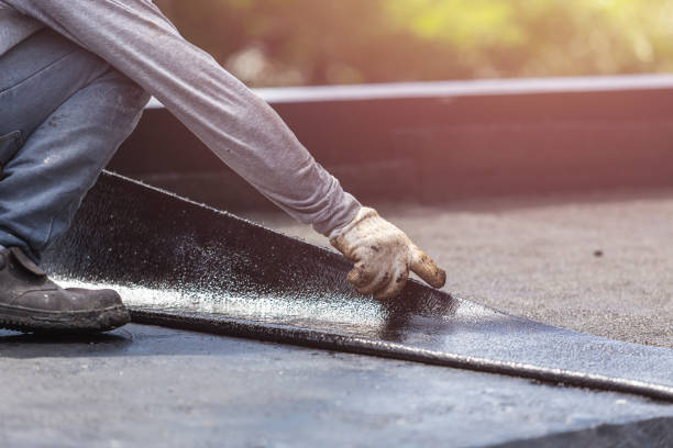 Professional Waterproofing technician working in Medford, OR
